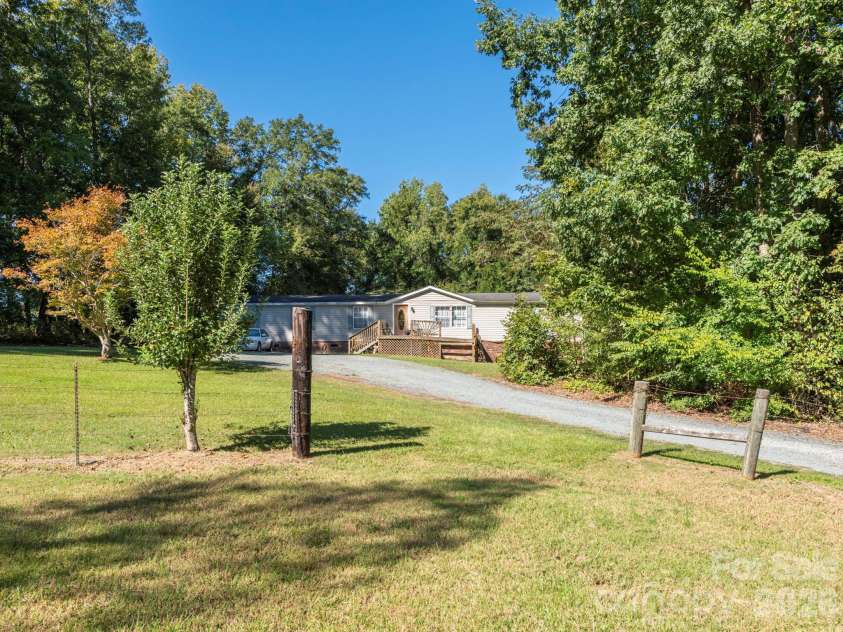 2292 Thornwell Road, Lancaster, SC 29720.  MLS# CAR4422898, YatesRealty ID 55474. Front Exterior and Driveway