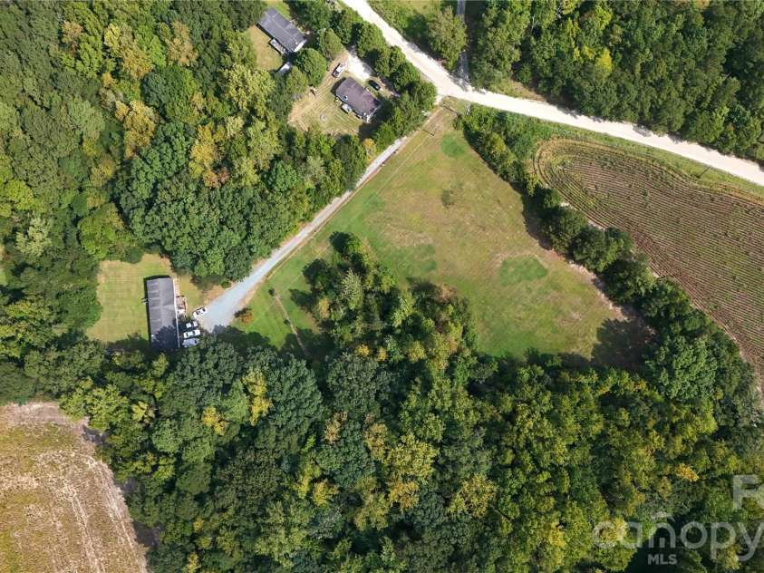 2292 Thornwell Road, Lancaster, SC 29720.  MLS# CAR4422898, YatesRealty ID 55474. It features a tranquil NATURAL SPRING running across the front of the property