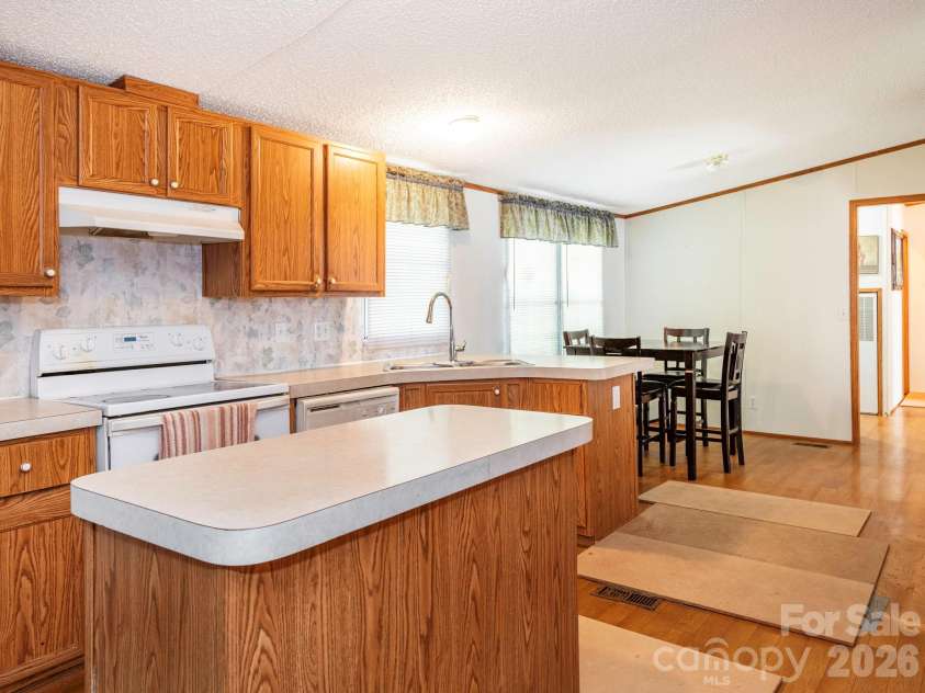 2292 Thornwell Road, Lancaster, SC 29720.  MLS# CAR4422898, YatesRealty ID 55474. Kitchen and Dining Area