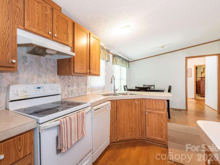 2292 Thornwell Road, Lancaster, SC 29720.  MLS# CAR4422898, YatesRealty ID 55474. Kitchen looking into dining area