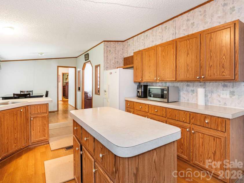 2292 Thornwell Road, Lancaster, SC 29720.  MLS# CAR4422898, YatesRealty ID 55474. Kitchen with Island that offers storage