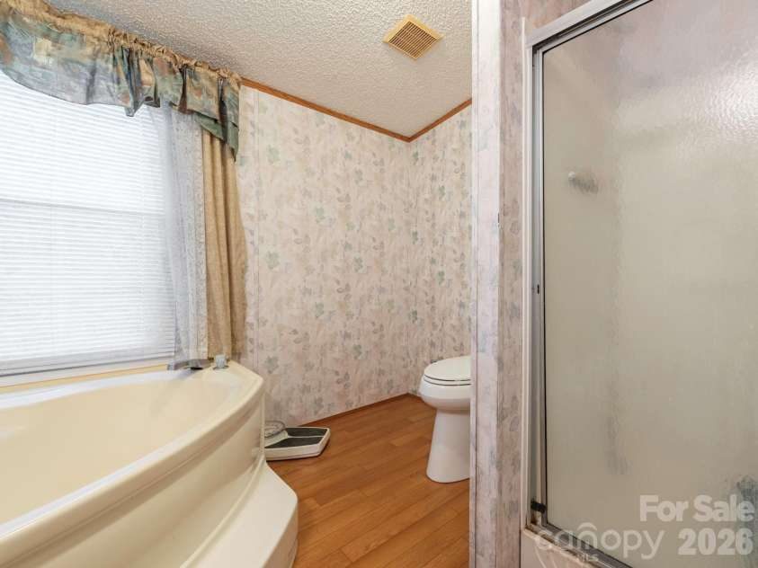 2292 Thornwell Road, Lancaster, SC 29720.  MLS# CAR4422898, YatesRealty ID 55474. Primary Bathroom with soaking tub and separate shower