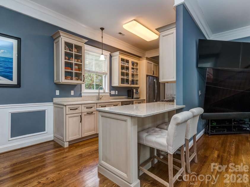 8211 Strandhill Road, Huntersville, NC 28078.  MLS# CAR4428753, YatesRealty ID 55477. Kitchen with bar seating