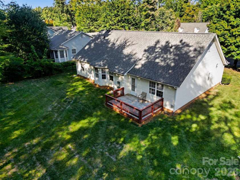 11609 Long Forest Drive, Charlotte, NC 28269.  MLS# CAR4430770, YatesRealty ID 55484. Backyard View