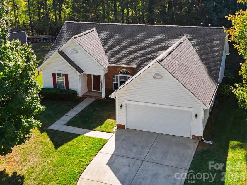 11609 Long Forest Drive, Charlotte, NC 28269.  MLS# CAR4430770, YatesRealty ID 55484. Front of the home