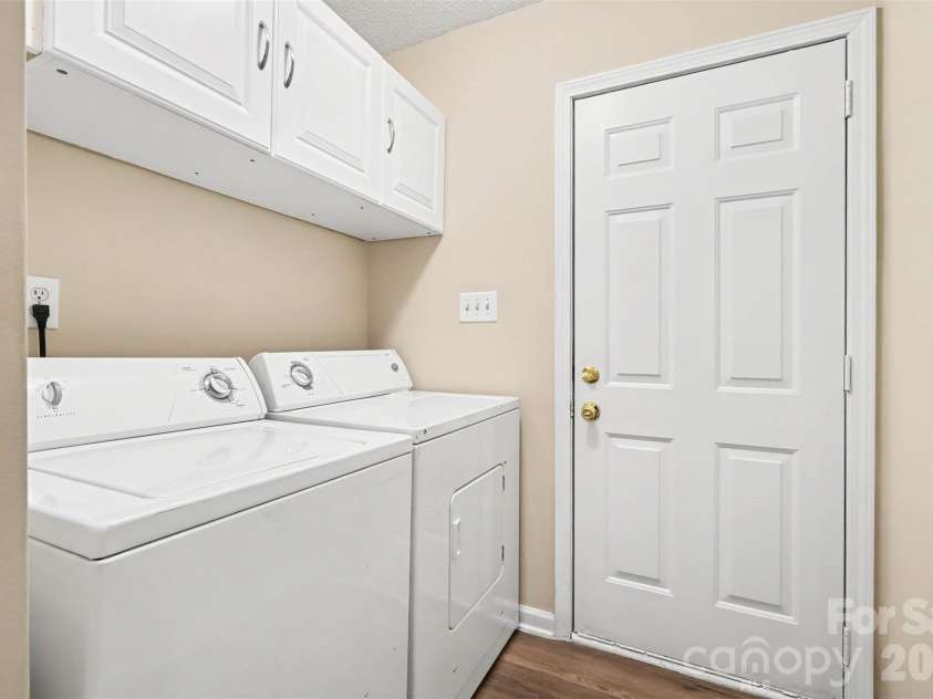 11609 Long Forest Drive, Charlotte, NC 28269.  MLS# CAR4430770, YatesRealty ID 55484. Laundry Room with garage access