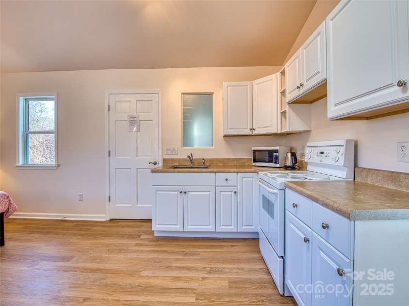 12 Lila Lane, Leicester, NC 28748.  MLS# CAR4254500, YatesRealty ID 555. Upper Level Kitchen