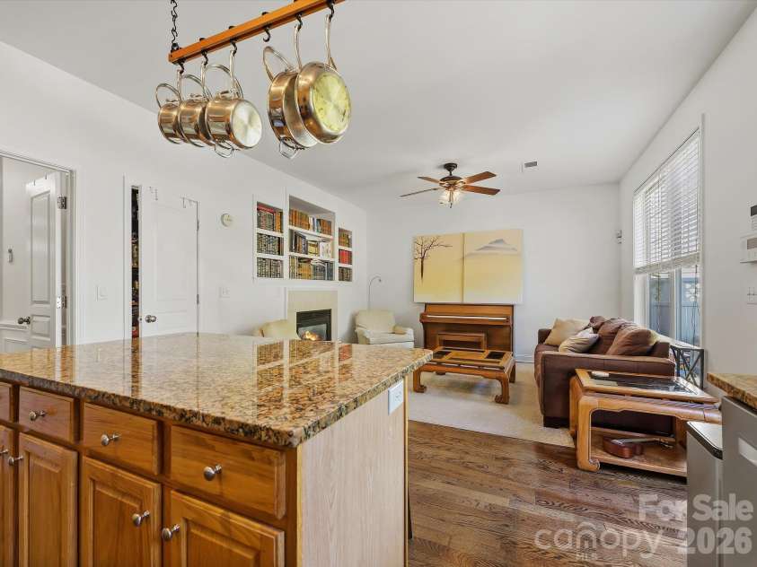 11732 Windy Mist Way, Huntersville, NC 28078.  MLS# CAR4431912, YatesRealty ID 55502. The spacious kitchen opens seamlessly to the great room, creating an inviting open-concept layout ideal for everyday living and entertaining.