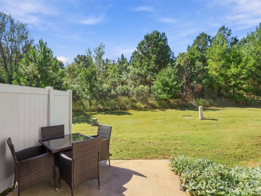 1020 Archibald Avenue, Fort Mill, SC 29708.  MLS# CAR4432759, YatesRealty ID 55510. Backyard- natural landscape creates a great privacy buffer