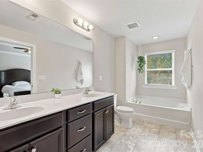 1020 Archibald Avenue, Fort Mill, SC 29708.  MLS# CAR4432759, YatesRealty ID 55510. Bedroom 2 ensuite bath