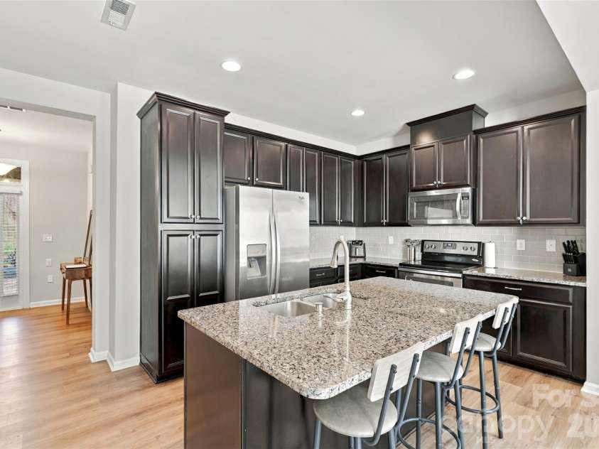 1020 Archibald Avenue, Fort Mill, SC 29708.  MLS# CAR4432759, YatesRealty ID 55510. Kitchen- spacious island, granite countertops