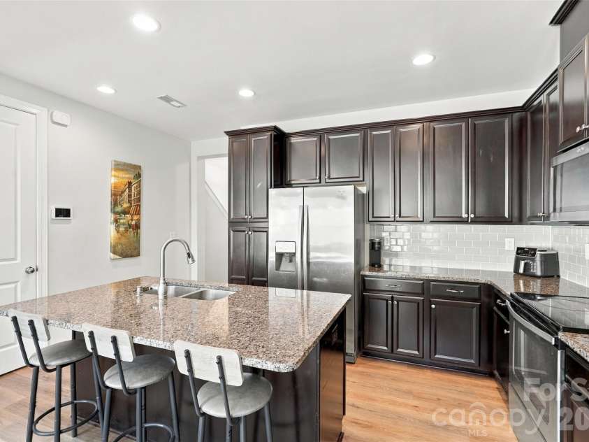 1020 Archibald Avenue, Fort Mill, SC 29708.  MLS# CAR4432759, YatesRealty ID 55510. Kitchen- spacious island, granite countertops