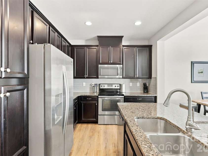 1020 Archibald Avenue, Fort Mill, SC 29708.  MLS# CAR4432759, YatesRealty ID 55510. Kitchen- spacious island, granite countertops