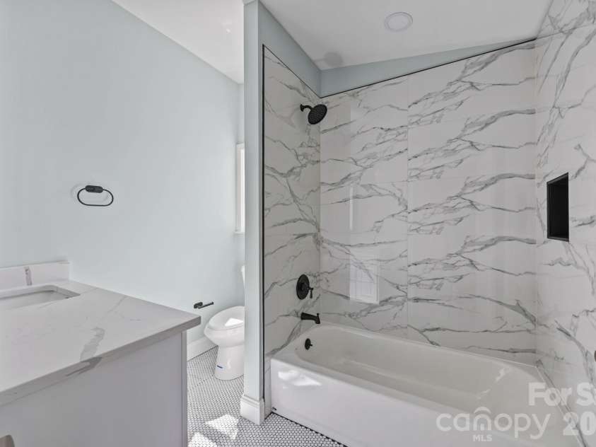 215 Crescent Heights Drive, Salisbury, NC 28146.  MLS# CAR4359710, YatesRealty ID 5552. Primary en-suite bathroom