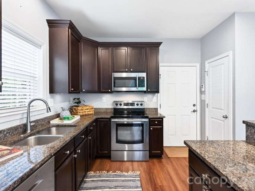 62 Kirby Road, Asheville, NC 28806.  MLS# CAR4431390, YatesRealty ID 55523. Generous Storage and Granite Counters