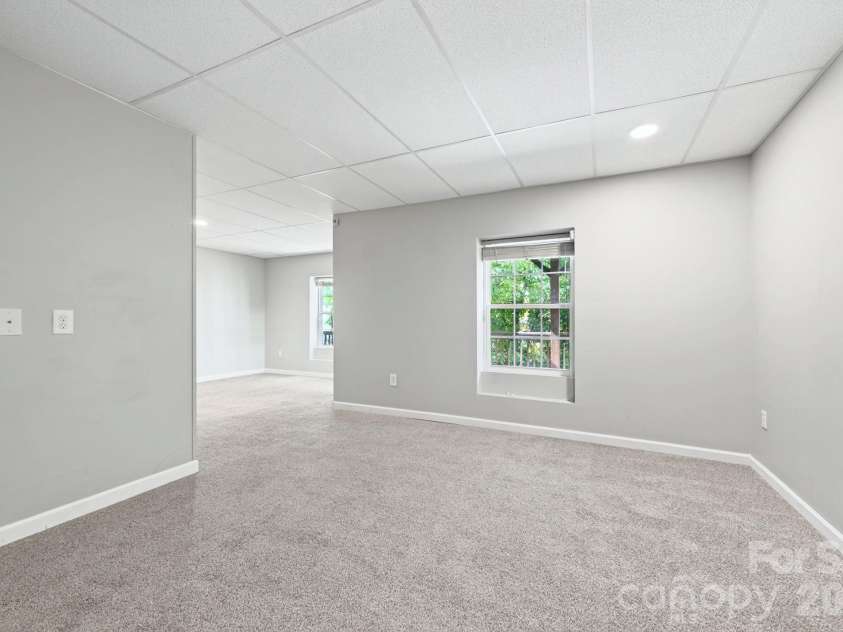62 Kirby Road, Asheville, NC 28806.  MLS# CAR4431390, YatesRealty ID 55523. Lower Level Bonus Space