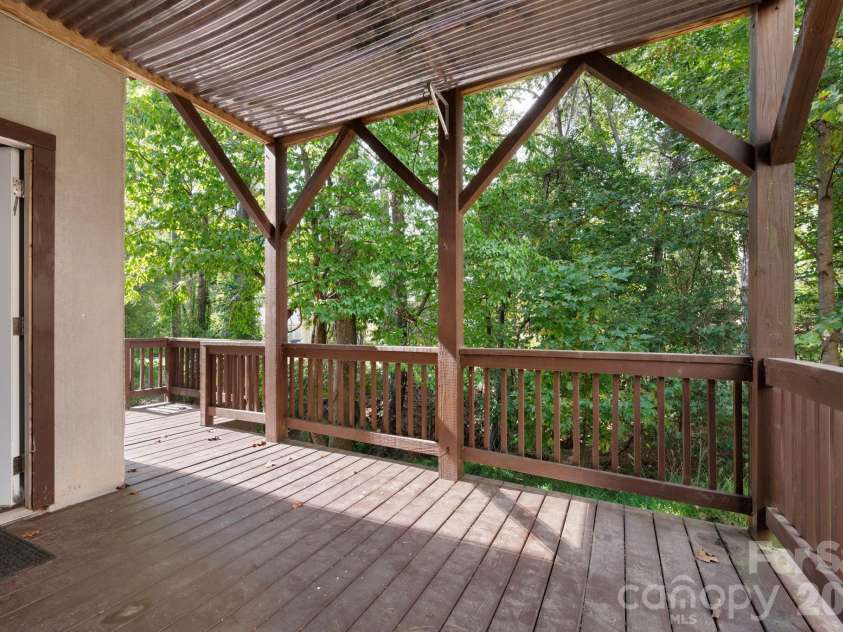 62 Kirby Road, Asheville, NC 28806.  MLS# CAR4431390, YatesRealty ID 55523. Lower Level Covered Deck