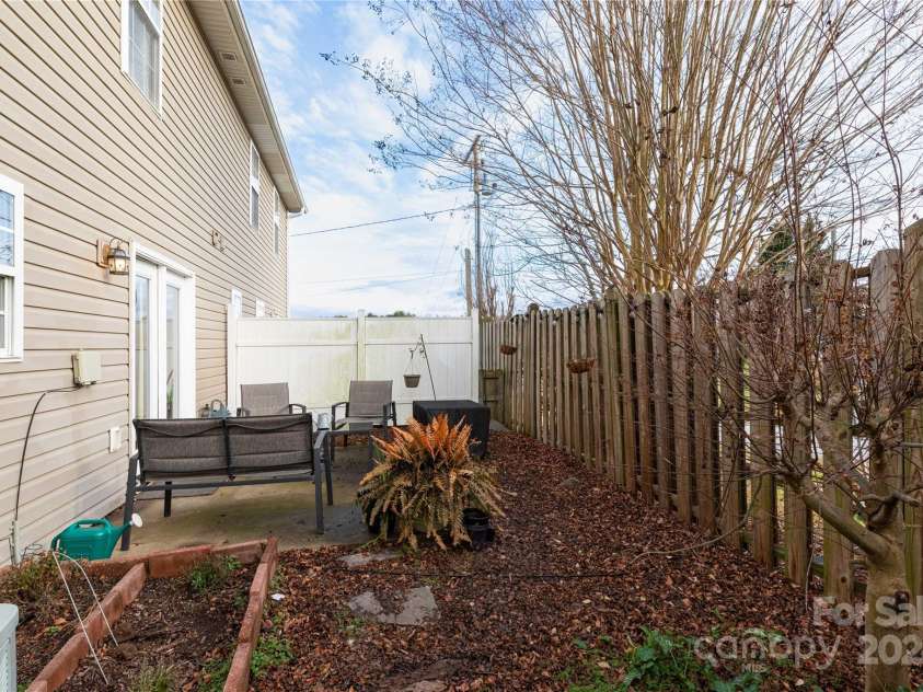 22 Yorktown Circle, Fletcher, NC 28732.  MLS# CAR4207413, YatesRealty ID 5553. Back Patio/Fenced Area