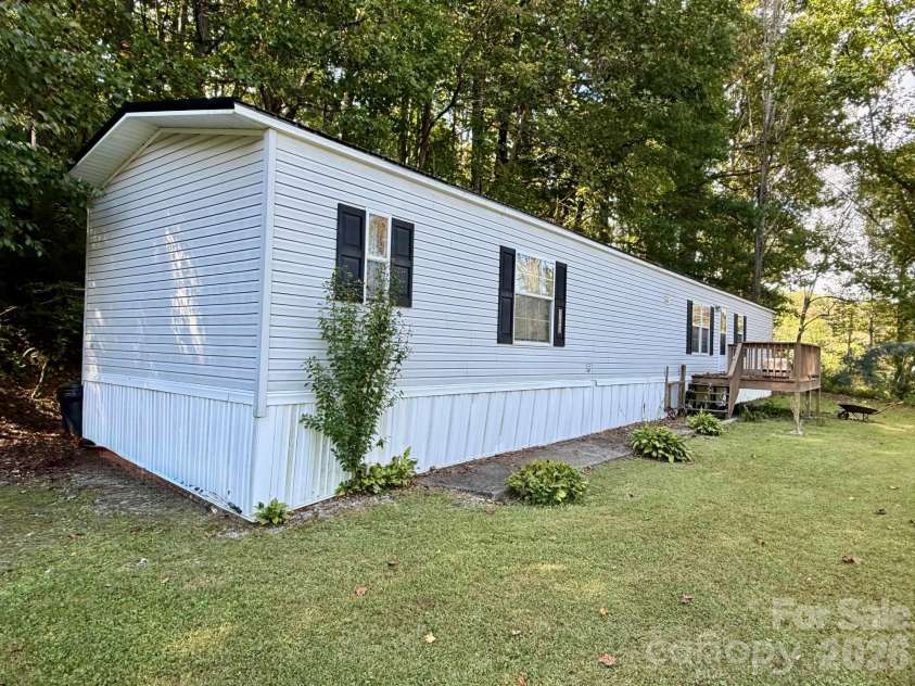 880 G W Whitmire Road, Rosman, NC 28772.  MLS# CAR4427376, YatesRealty ID 55565. Level Yard