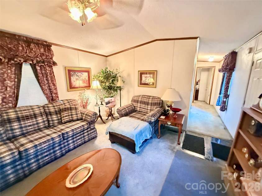 880 G W Whitmire Road, Rosman, NC 28772.  MLS# CAR4427376, YatesRealty ID 55565. Spacious Living Room