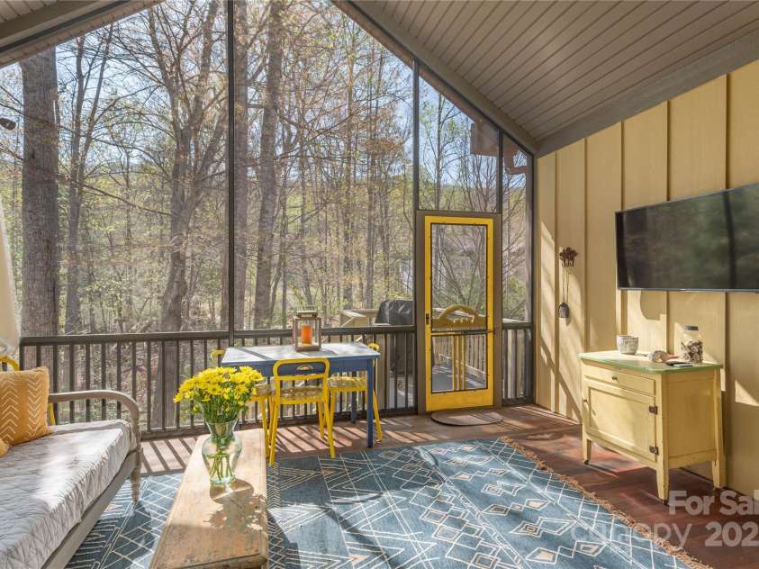 28 Sparkle Dun Drive, Biltmore Lake, NC 28715.  MLS# CAR4286512, YatesRealty ID 5557. Incredible screened in porch overlooking private yard