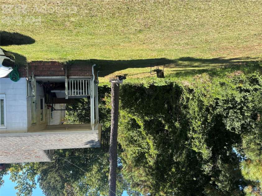 2615 Anderson Road, Catawba, SC 29704.  MLS# CAR4432488, YatesRealty ID 55575. Left side view - Side porch