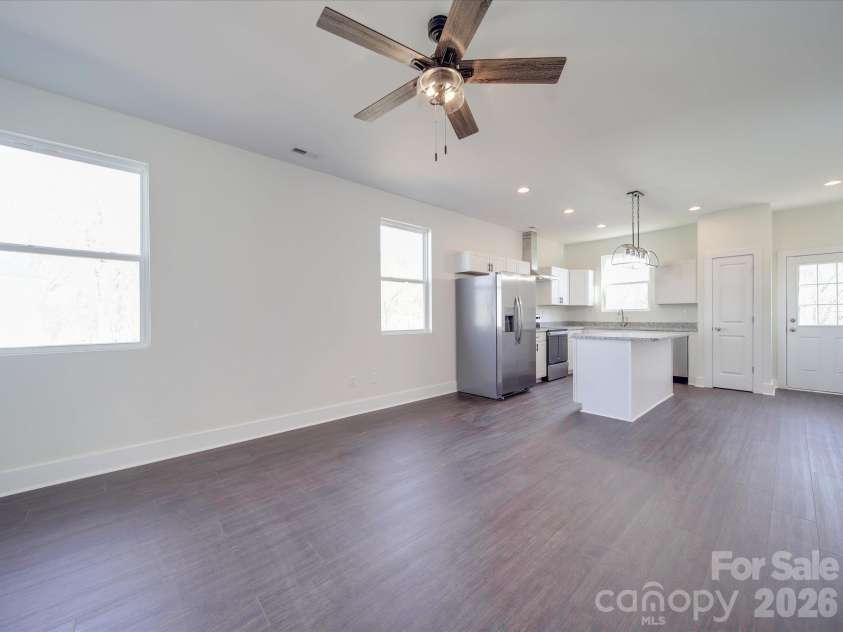 102 Snyder Court, Concord, NC 28025.  MLS# CAR4428517, YatesRealty ID 55579. Open floor plan, kitchen and living area