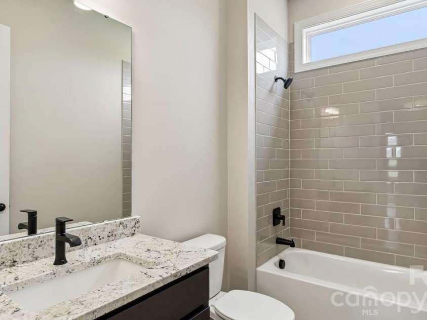 205 Marina Bay Trail, Locust, NC 28097.  MLS# CAR4432490, YatesRealty ID 55593. Bedroom 3 En Suite