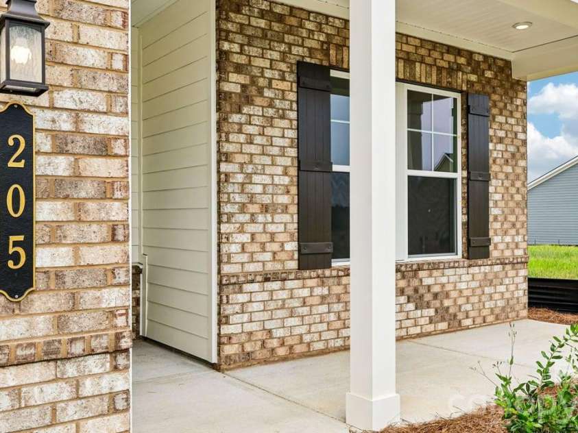 205 Marina Bay Trail, Locust, NC 28097.  MLS# CAR4432490, YatesRealty ID 55593. Covered Entry