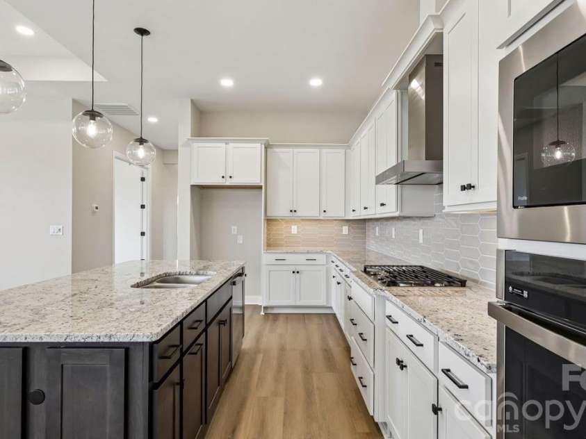 205 Marina Bay Trail, Locust, NC 28097.  MLS# CAR4432490, YatesRealty ID 55593. Designer Kitchen