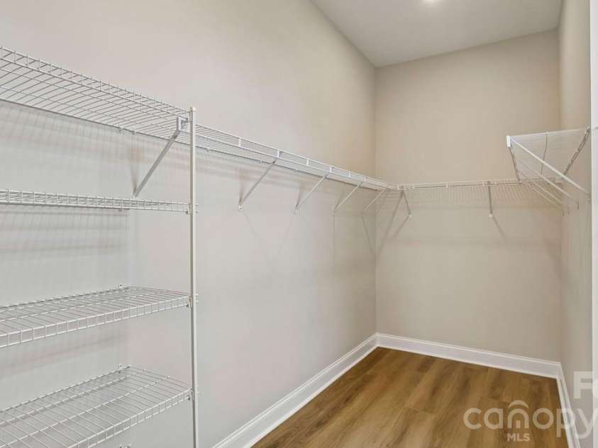 205 Marina Bay Trail, Locust, NC 28097.  MLS# CAR4432490, YatesRealty ID 55593. Primary Bedroom Walk-In Closet
