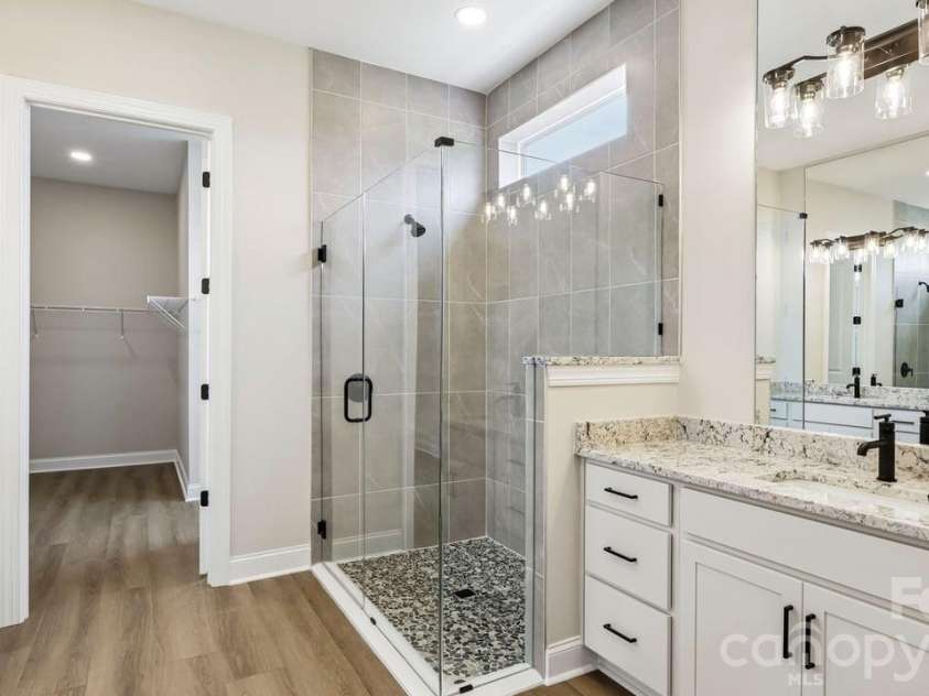 205 Marina Bay Trail, Locust, NC 28097.  MLS# CAR4432490, YatesRealty ID 55593. Primary En Suite