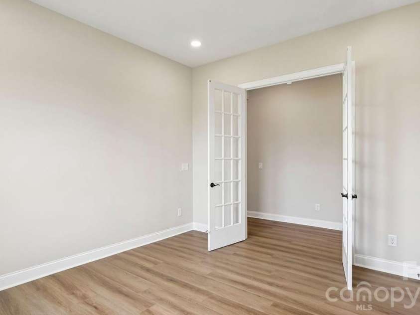 205 Marina Bay Trail, Locust, NC 28097.  MLS# CAR4432490, YatesRealty ID 55593. Study with French Doors