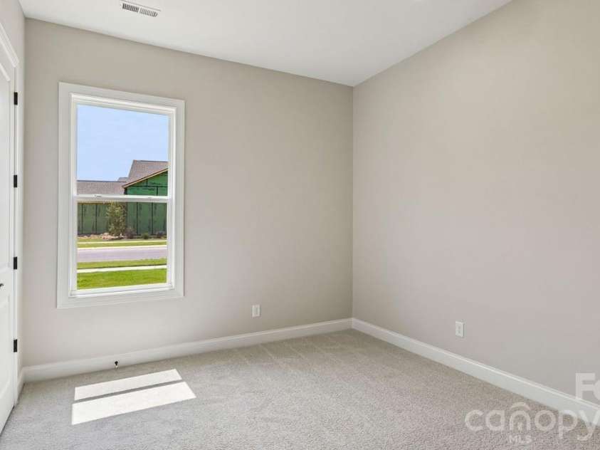 303 Marina Bay Trail, Locust, NC 28097.  MLS# CAR4430586, YatesRealty ID 55596. Bedroom 2