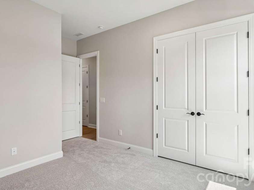 303 Marina Bay Trail, Locust, NC 28097.  MLS# CAR4430586, YatesRealty ID 55596. Bedroom 2