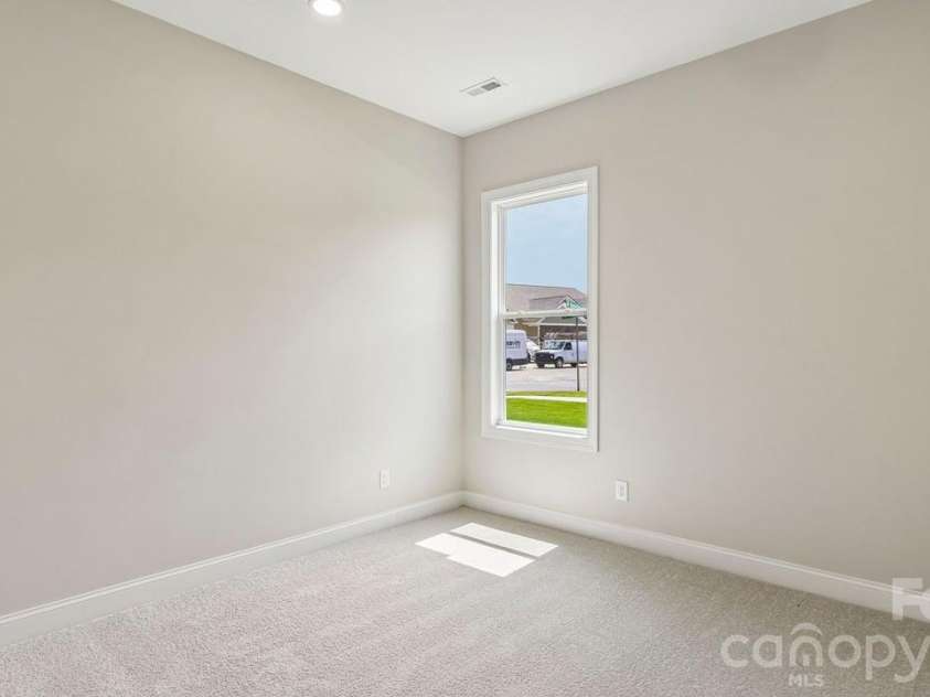 303 Marina Bay Trail, Locust, NC 28097.  MLS# CAR4430586, YatesRealty ID 55596. Bedroom 3