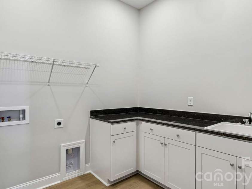 303 Marina Bay Trail, Locust, NC 28097.  MLS# CAR4430586, YatesRealty ID 55596. Laundry