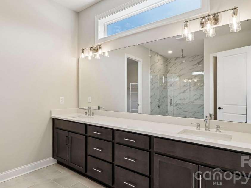303 Marina Bay Trail, Locust, NC 28097.  MLS# CAR4430586, YatesRealty ID 55596. Primary En Suite