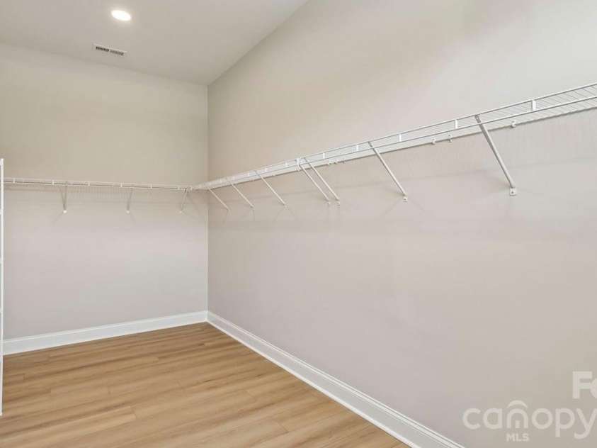303 Marina Bay Trail, Locust, NC 28097.  MLS# CAR4430586, YatesRealty ID 55596. Primary En Suite Closet