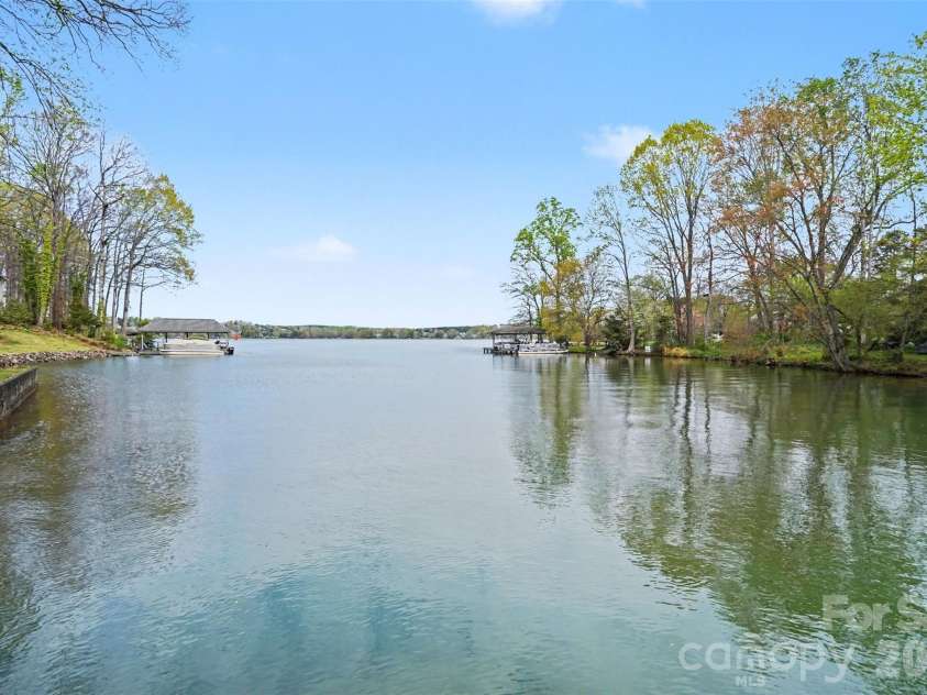 185 Appian Way, Shelby, NC 28150.  MLS# CAR4395118, YatesRealty ID 55602. Deep water dock on a private cove--this can't be beat!