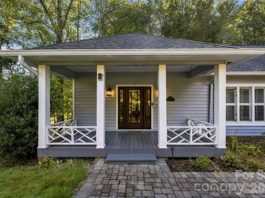185 Appian Way, Shelby, NC 28150.  MLS# CAR4395118, YatesRealty ID 55602. Freshly painted covered front porch with chippendale railing