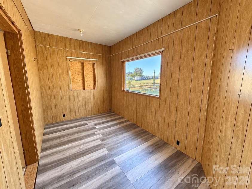 1727 Spencer Mountain Road, Gastonia, NC 28054.  MLS# CAR4432632, YatesRealty ID 55616. Additional room added on during previous ownership. Potential to be turned into a large bathroom.