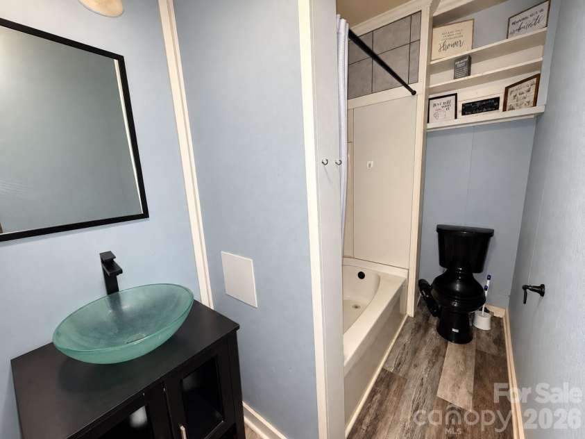 1727 Spencer Mountain Road, Gastonia, NC 28054.  MLS# CAR4432632, YatesRealty ID 55616. Renovated bathroom