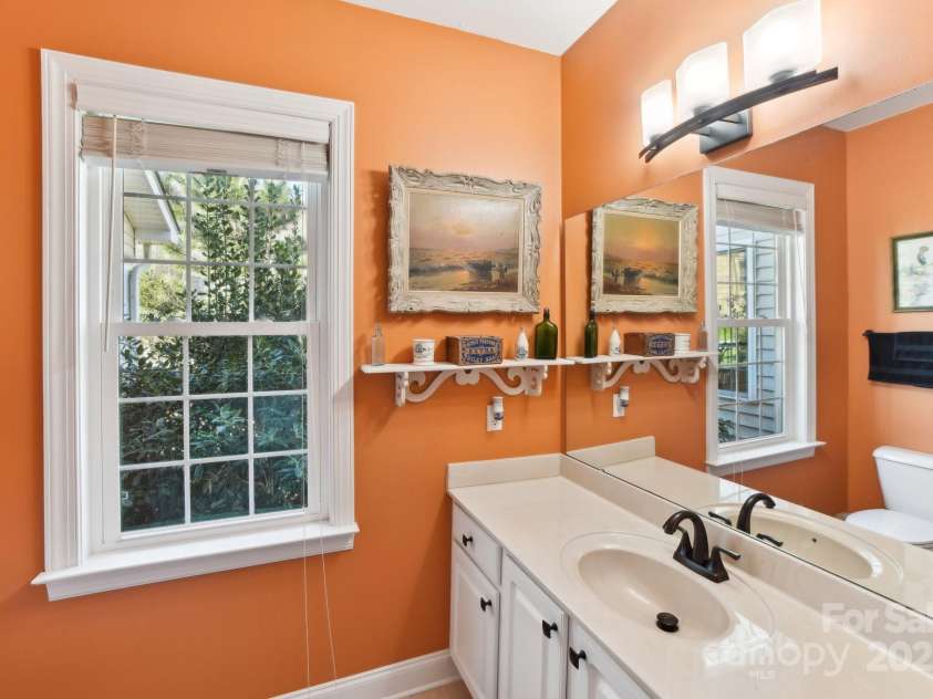 41 Golden Pond Way, Hendersonville, NC 28791.  MLS# CAR4237615, YatesRealty ID 5562. Bright second bath with tasteful colors and plenty of space