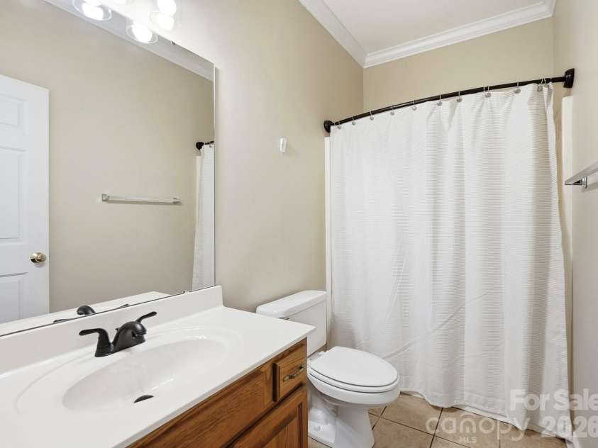 2301 Hunter Davis Court, Monroe, NC 28110.  MLS# CAR4428195, YatesRealty ID 55627. This split bedroom plan offers a shared bath that is also used for guests.