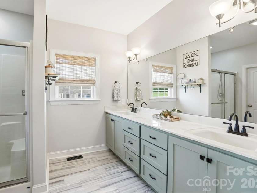 4004 Camden Oaks Lane, Monroe, NC 28110.  MLS# CAR4428200, YatesRealty ID 55628. Spacious Primary Bathroom