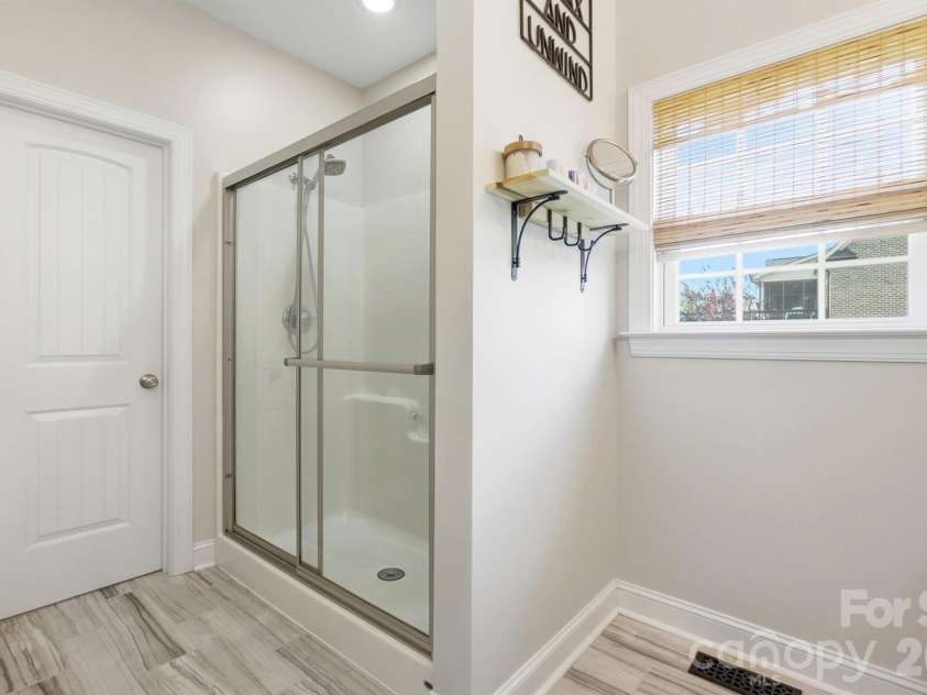 4004 Camden Oaks Lane, Monroe, NC 28110.  MLS# CAR4428200, YatesRealty ID 55628. Spacious Primary Bathroom