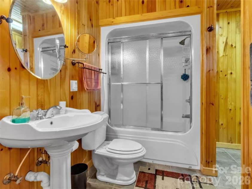 206 Sams Trail, Waynesville, NC 28786.  MLS# CAR4433077, YatesRealty ID 55642. Full basement bath