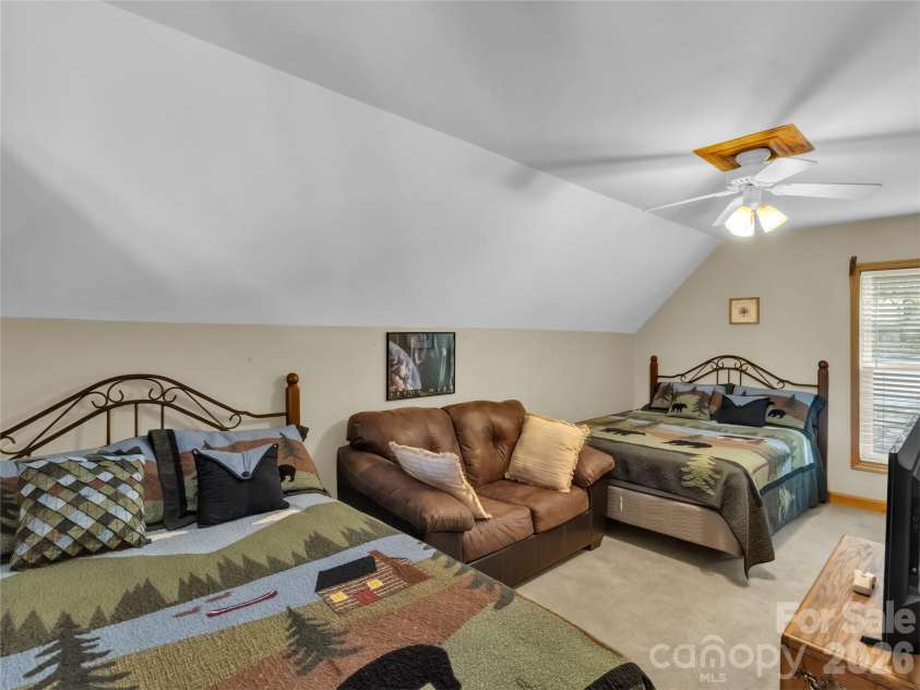 206 Sams Trail, Waynesville, NC 28786.  MLS# CAR4433077, YatesRealty ID 55642. Upper bedroom with full bath
