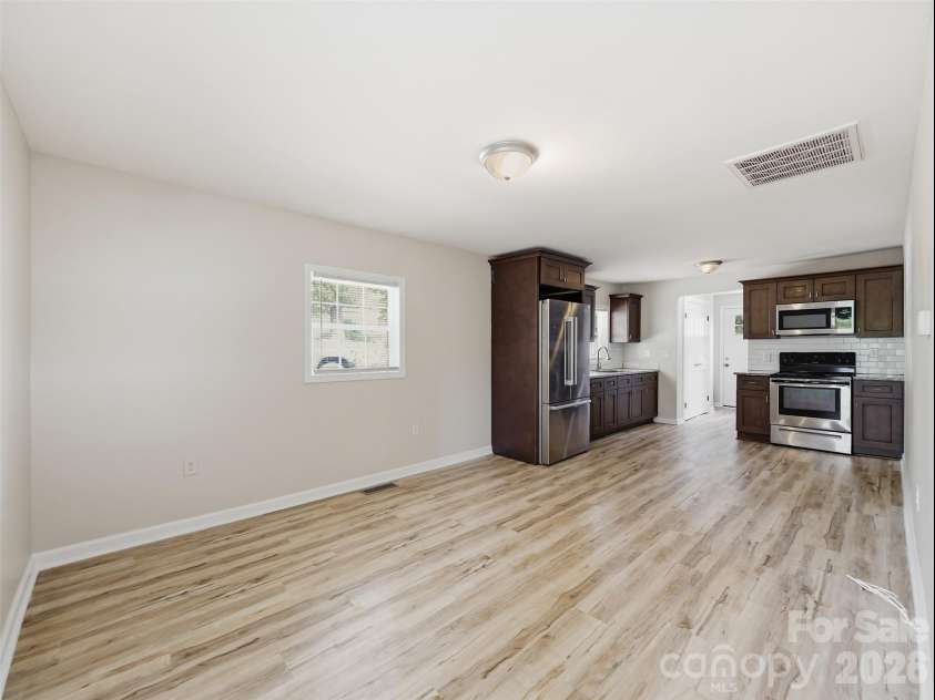 413 Pleasant Avenue, Kannapolis, NC 28081.  MLS# CAR4432895, YatesRealty ID 55647. Living Room